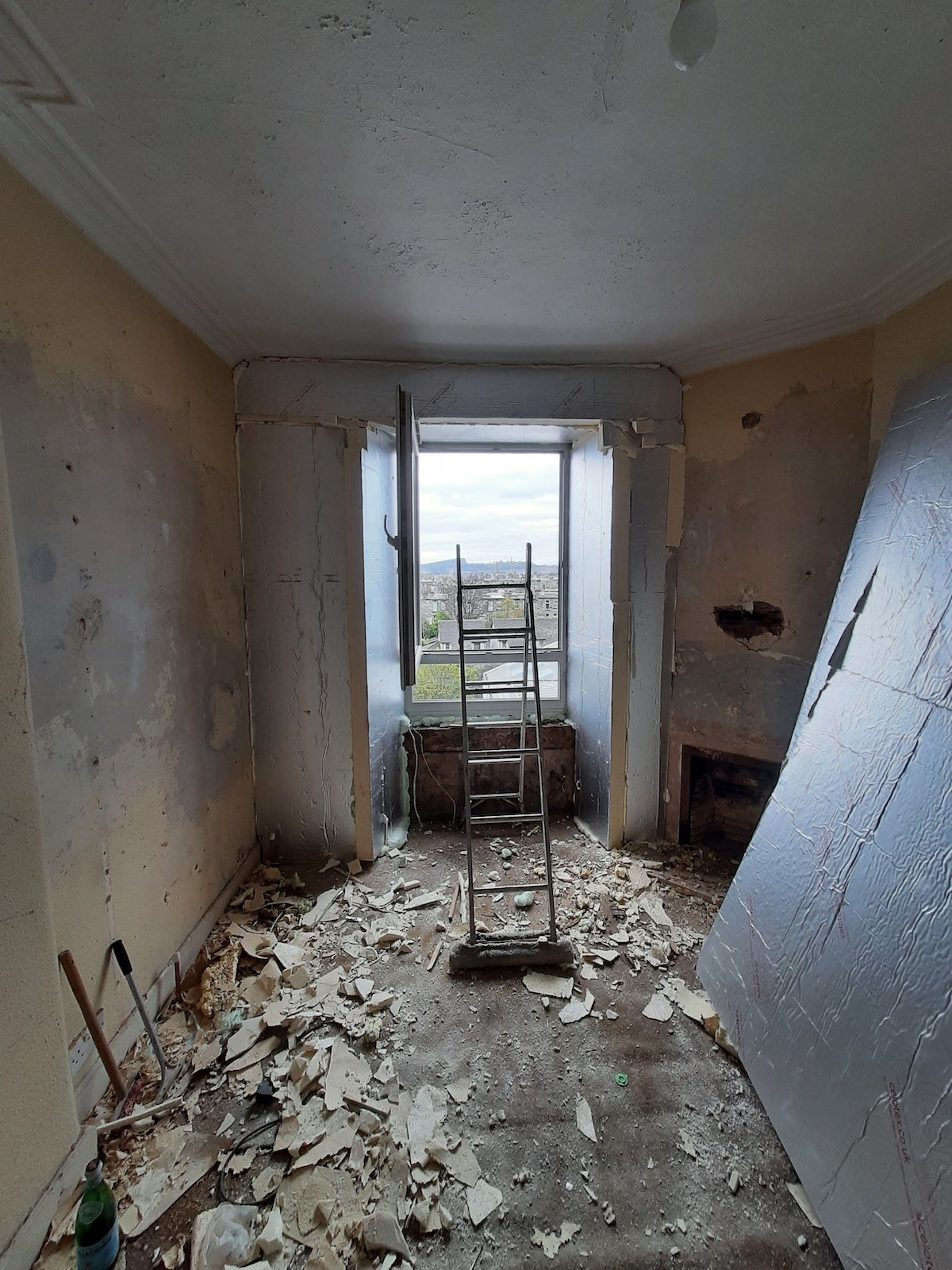 Room stripped back during a full flat renovation in Newhaven, Edinburgh